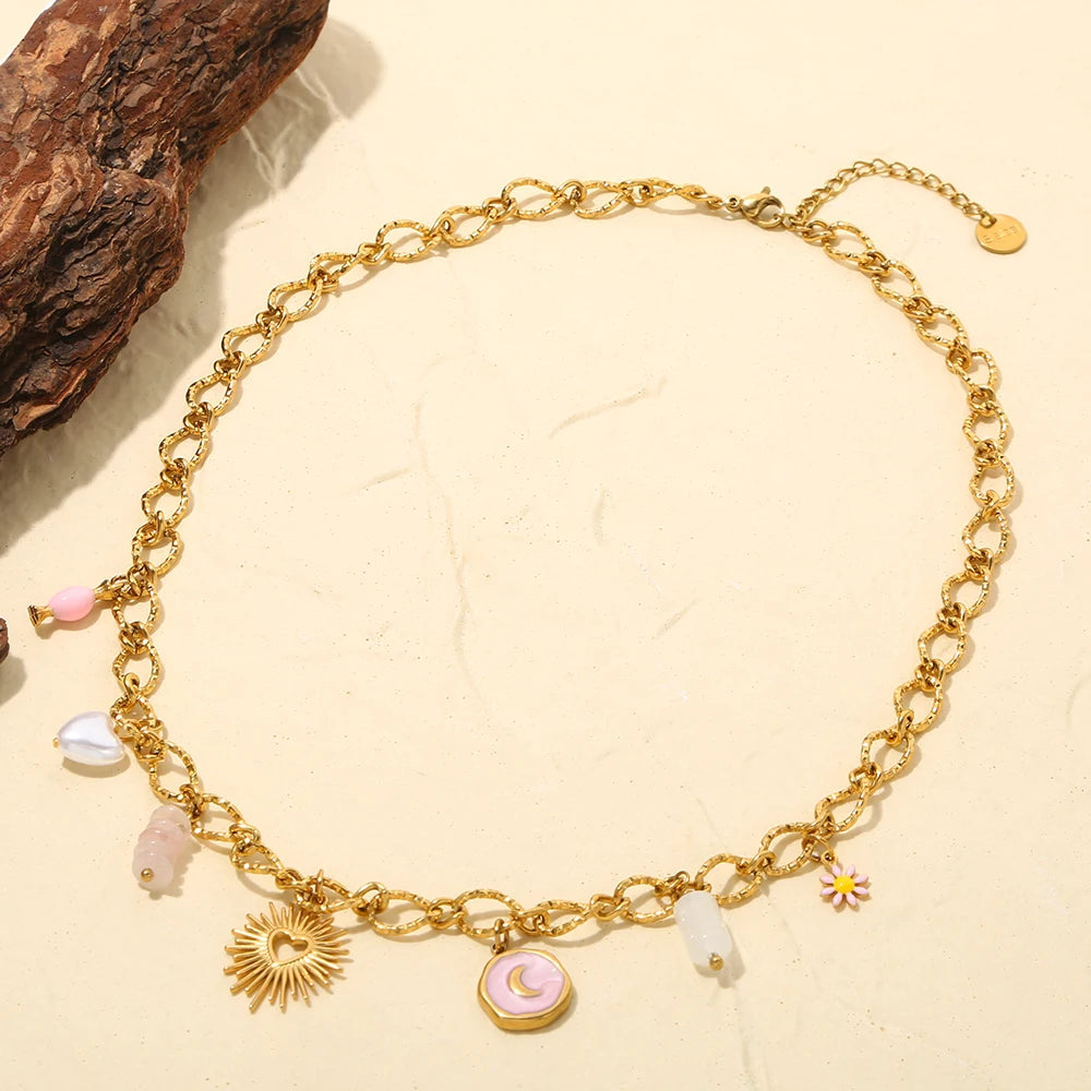 Collana Cuore di Sole – Pendente dorato con charms simbolici