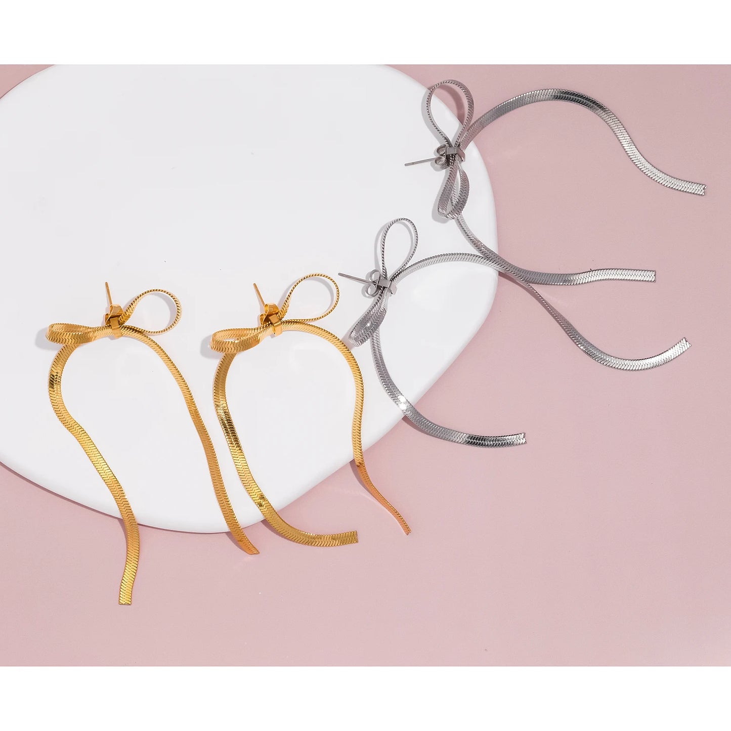 Orecchini Fiocco con Nappa β Eleganti e raffinati
