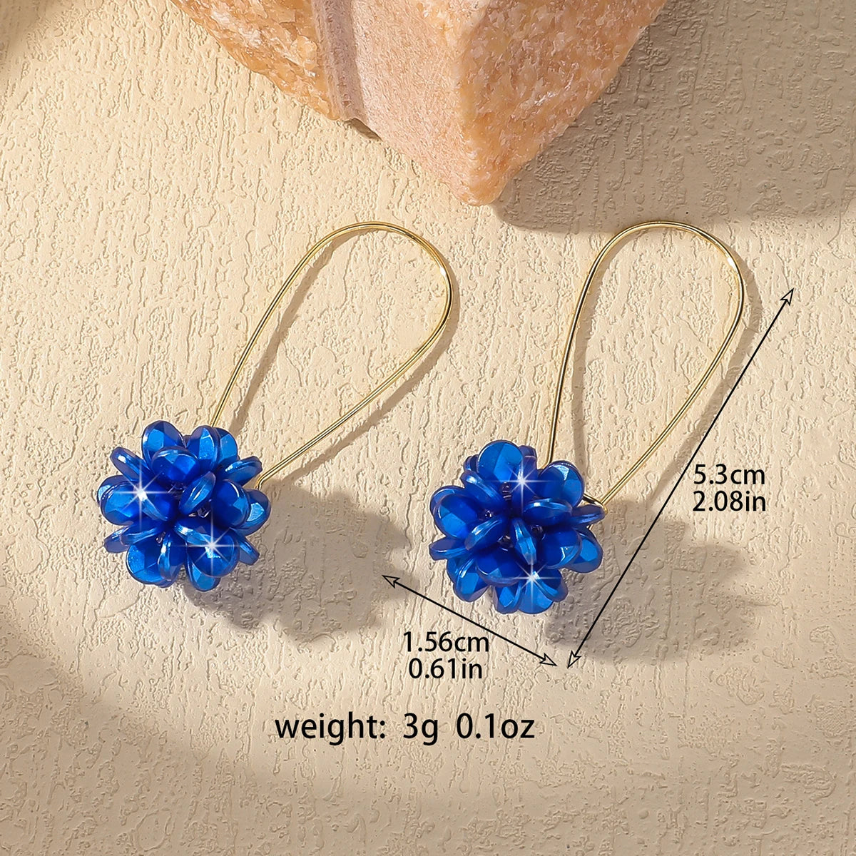 Orecchini a sfera con petali di perle – Delicatezza artigianale