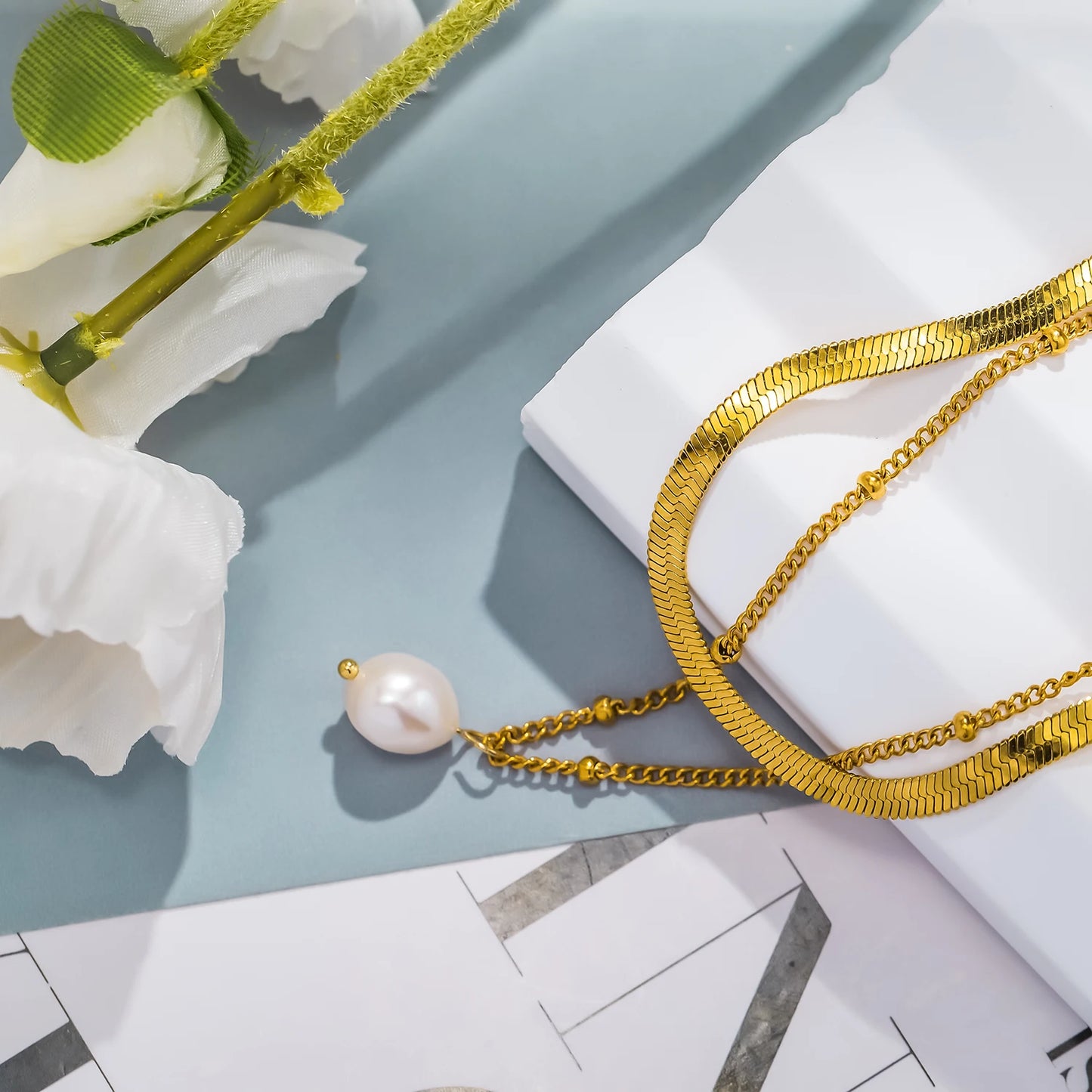 Collana “Doppio Incanto” – Perla & Catena Serpente