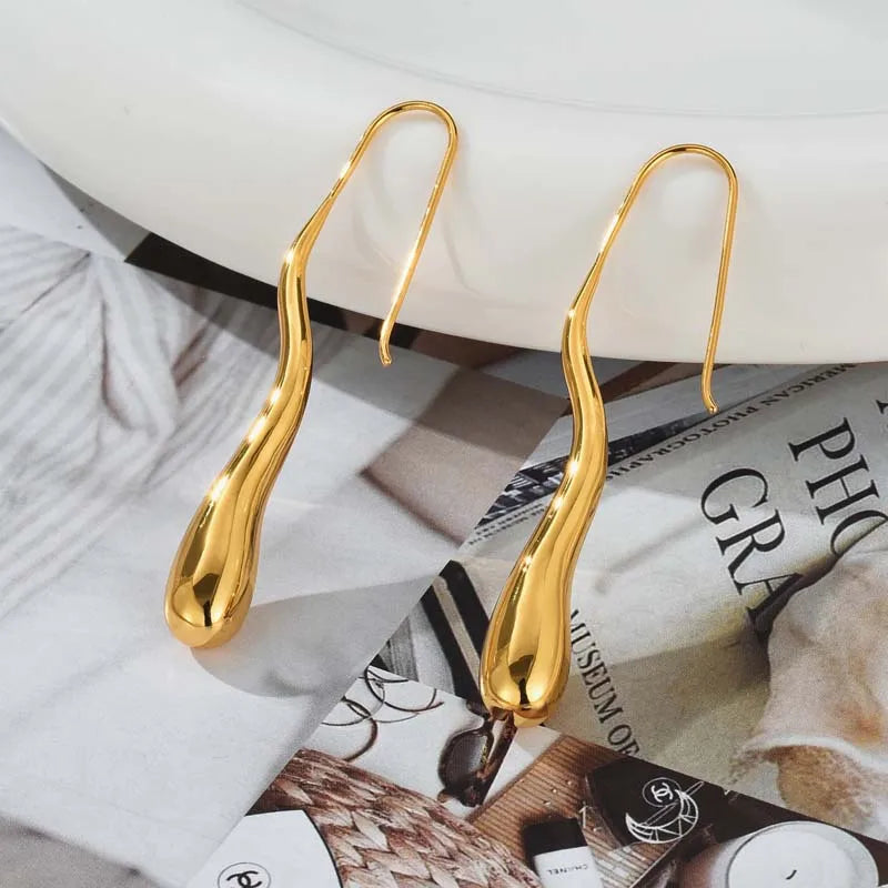 Orecchini “Goccia d’Oro” – Riflessi Irregolari