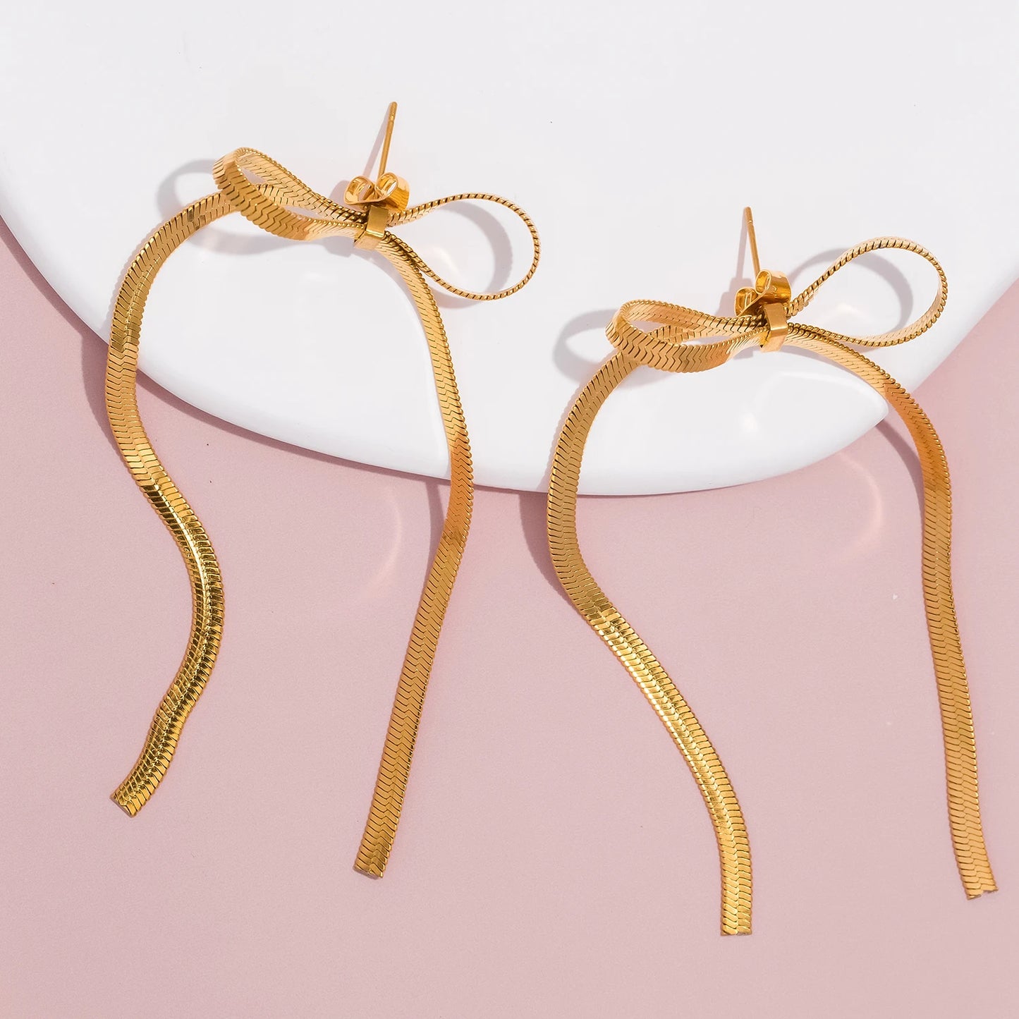 Orecchini Fiocco con Nappa β Eleganti e raffinati