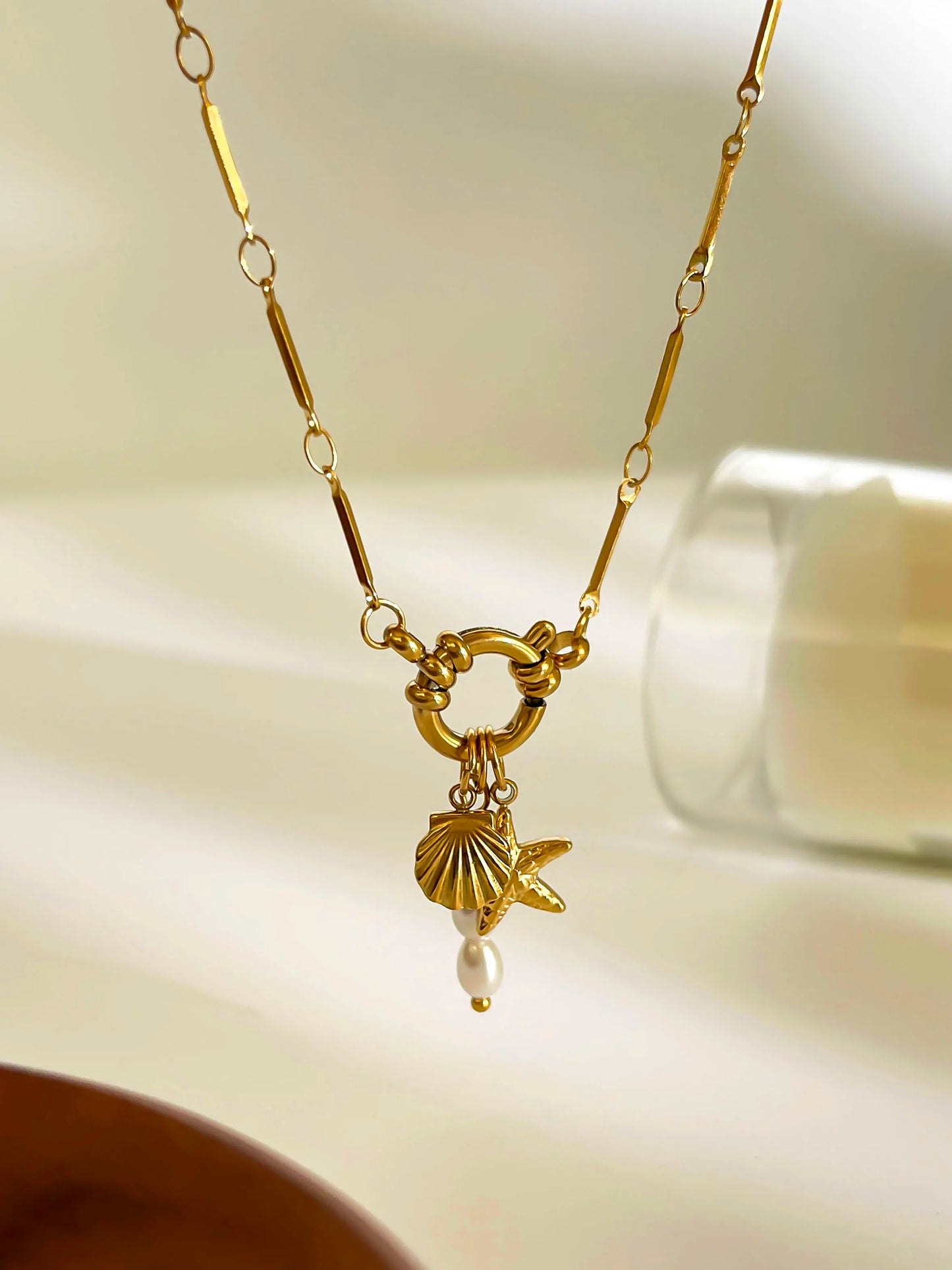 Collana Stella Marina e Conchiglia – Eleganza Estiva con Perla
