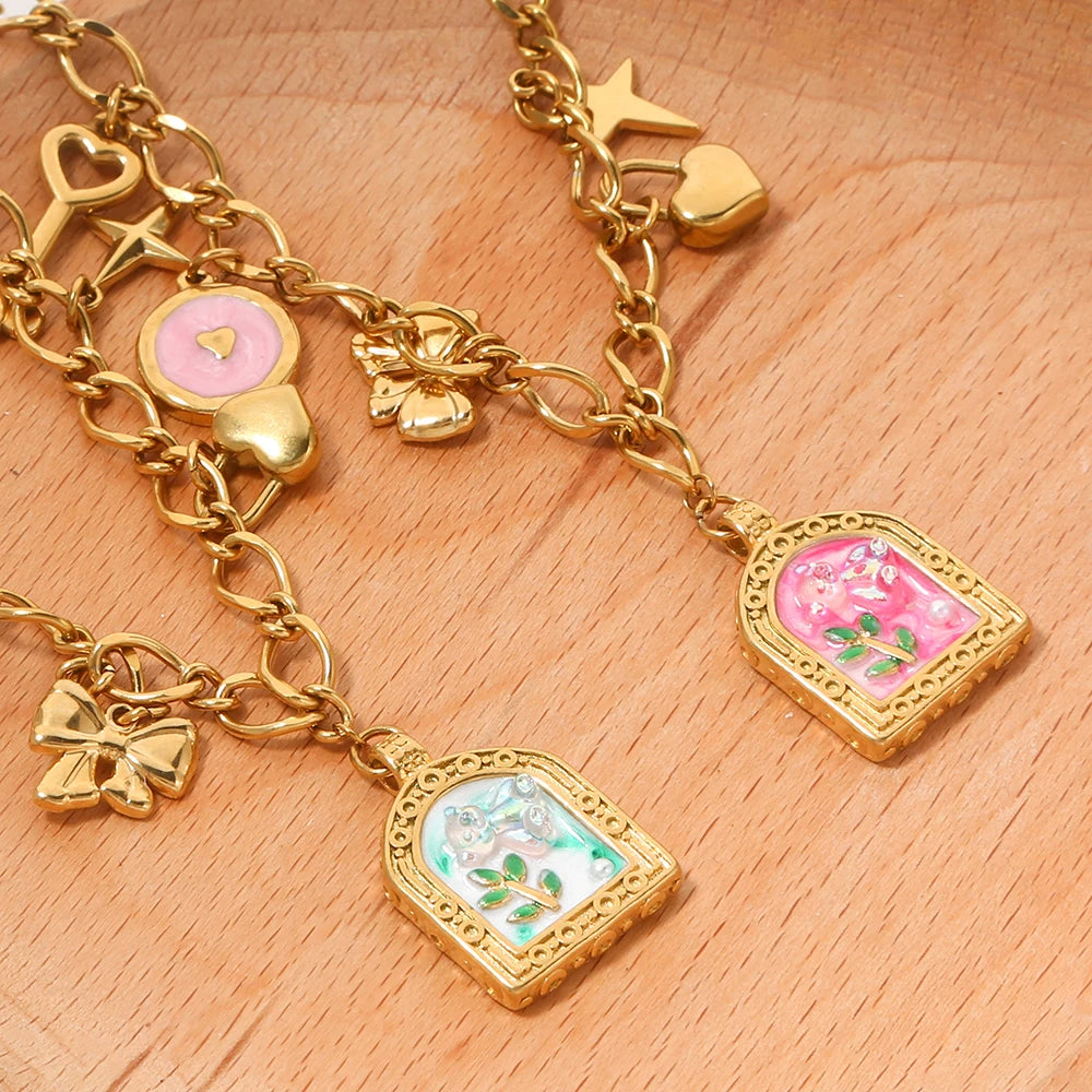 Collana con ciondolo fiore smaltato β 2 varianti rosa o azzurro β Acciaio dorato