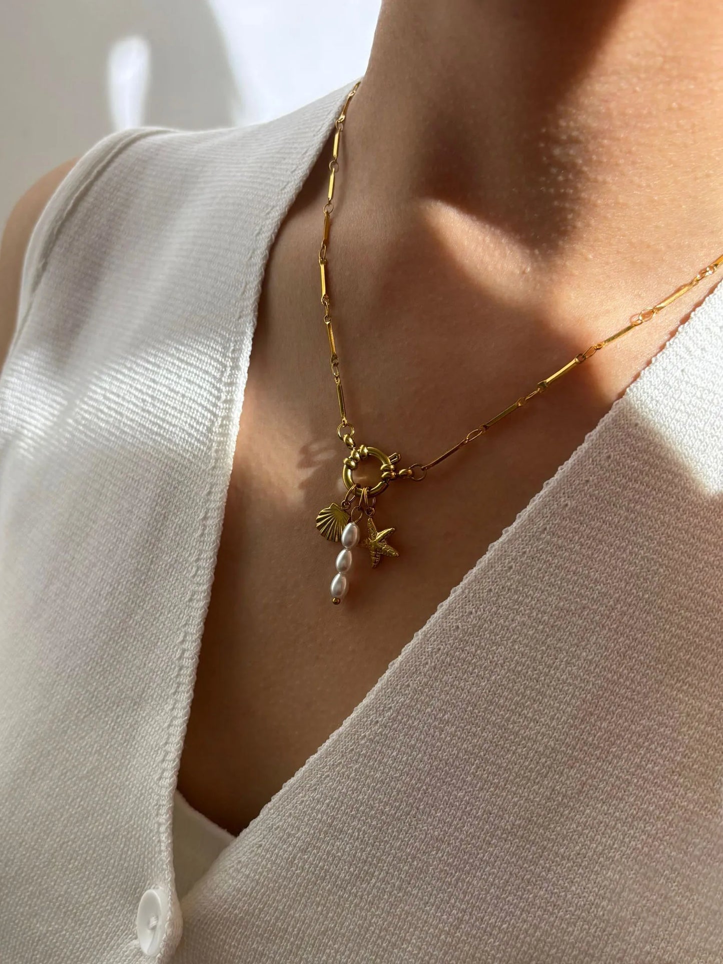 Collana Stella Marina e Conchiglia – Eleganza Estiva con Perla