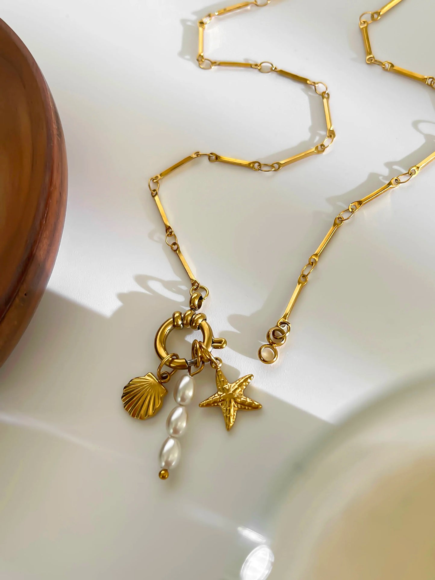 Collana Stella Marina e Conchiglia – Eleganza Estiva con Perla