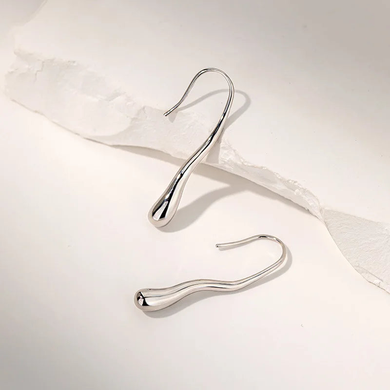Orecchini “Goccia d’Oro” – Riflessi Irregolari