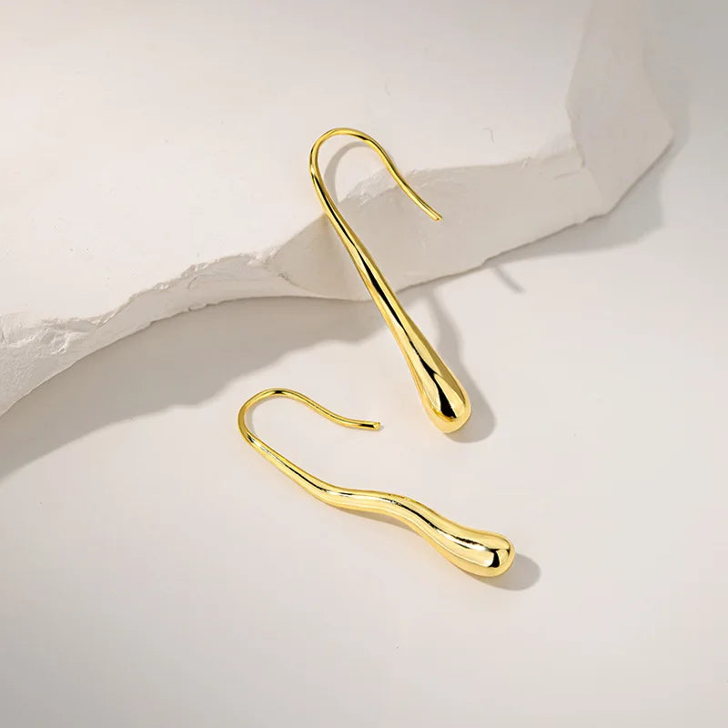 Orecchini “Goccia d’Oro” – Riflessi Irregolari