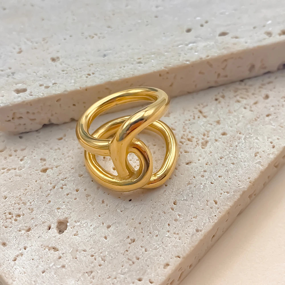 Anello “Twist Knot” – Linee Intrecciate