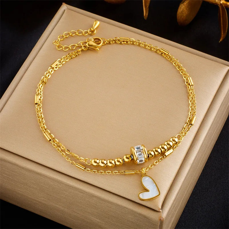 Collezione Cavigliere “Legami d’Amore” – Design a Cuore con Doppia Catena