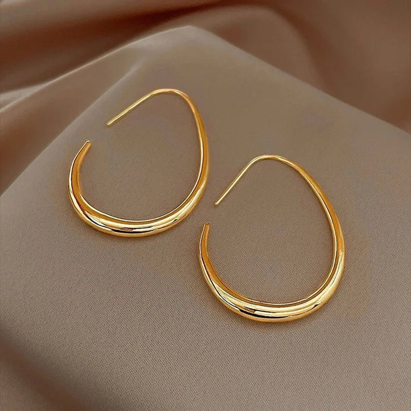 Orecchini pendenti “Eleganza Dorata”
