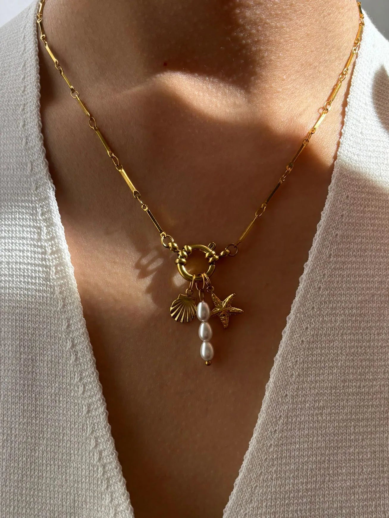 Collana Stella Marina e Conchiglia – Eleganza Estiva con Perla