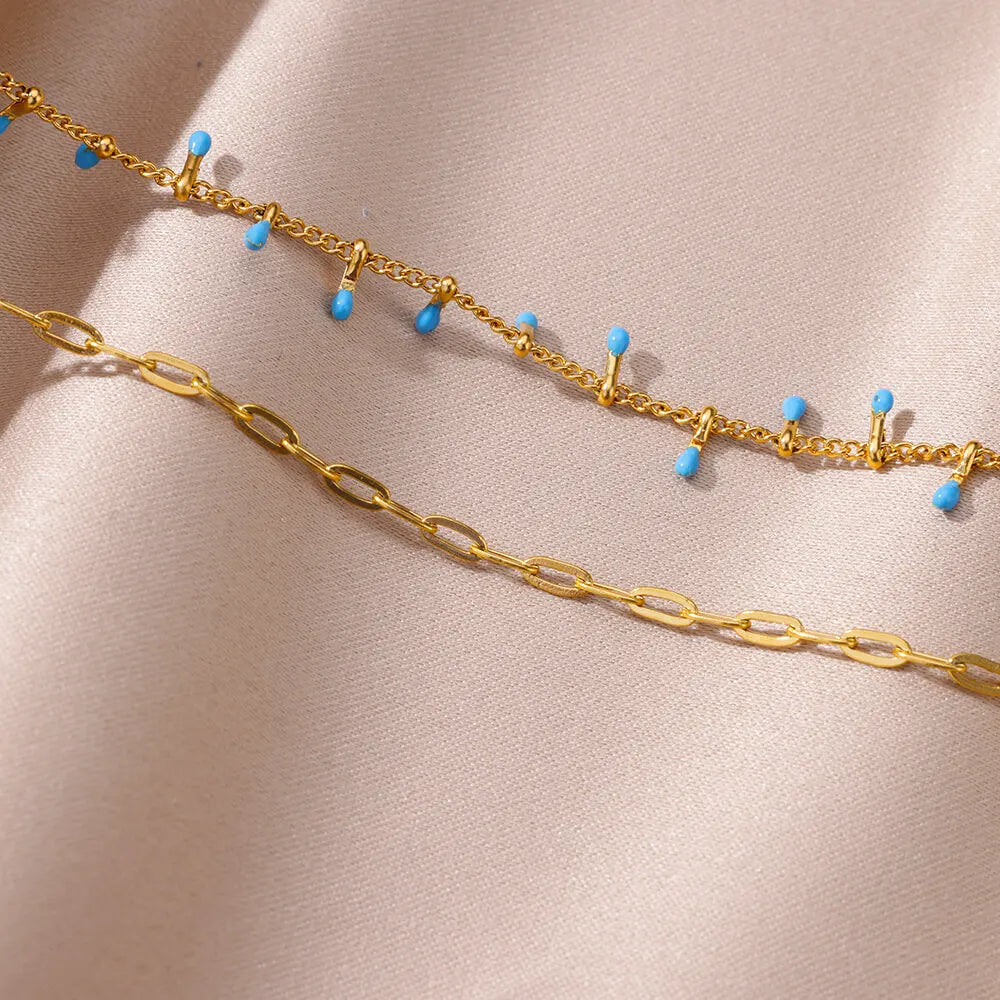 Cavigliera “Onde Boho” – Catena con Perline e Ciondolo