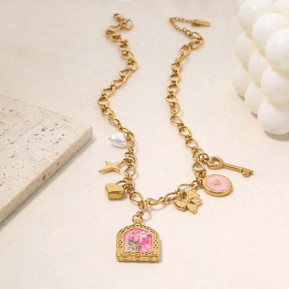 Collana con ciondolo fiore smaltato β 2 varianti rosa o azzurro β Acciaio dorato