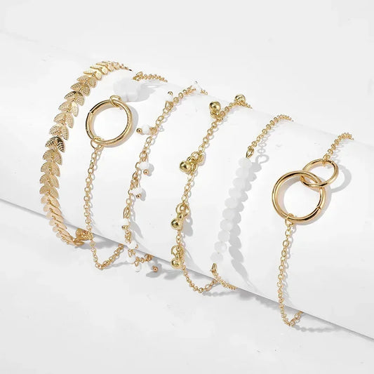 Collezione Dual Charm – Set Braccialetti Oro & Argento (5 o 6 pz)