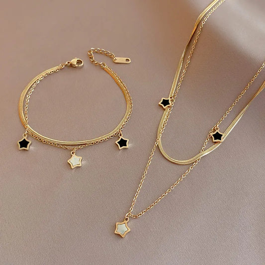 Set collana e bracciale a catena multistrato con stella – Desideri in acciaio