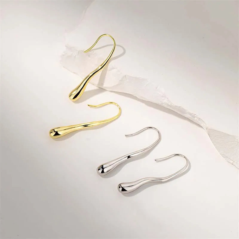 Orecchini “Goccia d’Oro” – Riflessi Irregolari
