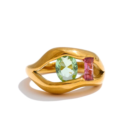 Anello “Doppia Visione” – Design fluido con zirconi verde e rosa