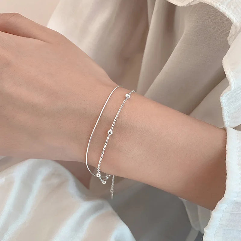 Desiderio in Argento – Bracciale Portafortuna a Doppio Strato"