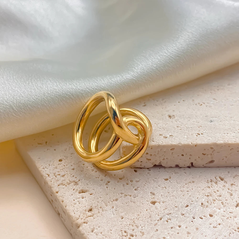 Anello “Twist Knot” – Linee Intrecciate