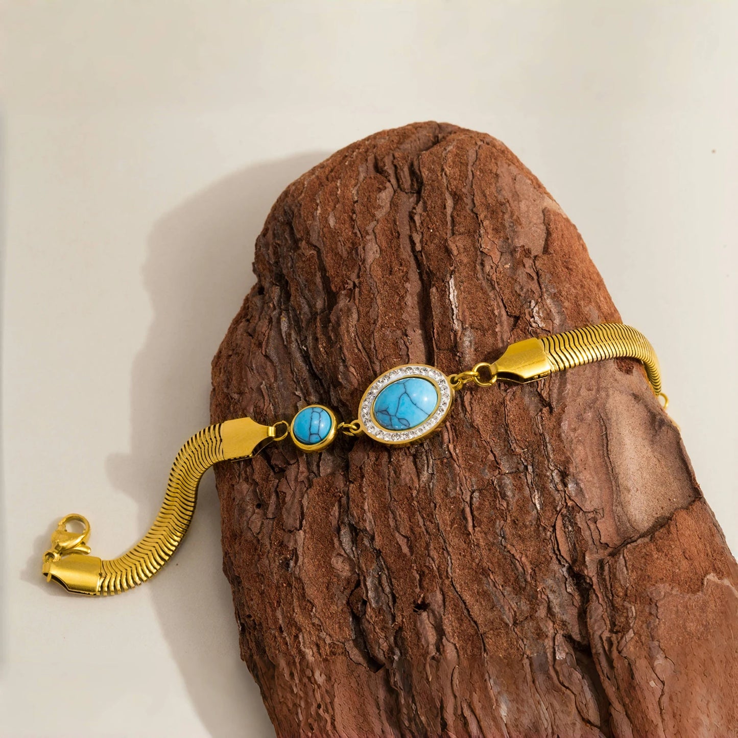 Bracciale Rigido con Zirconi Turchesi – Acciaio Inossidabile con Catena a Serpente Larga,