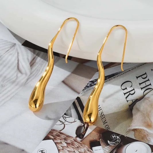 Orecchini “Goccia d’Oro” – Riflessi Irregolari