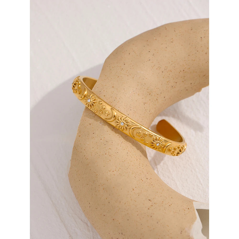 Bracciale rigido dorato con incisioni lunari in acciaio inossidabile
