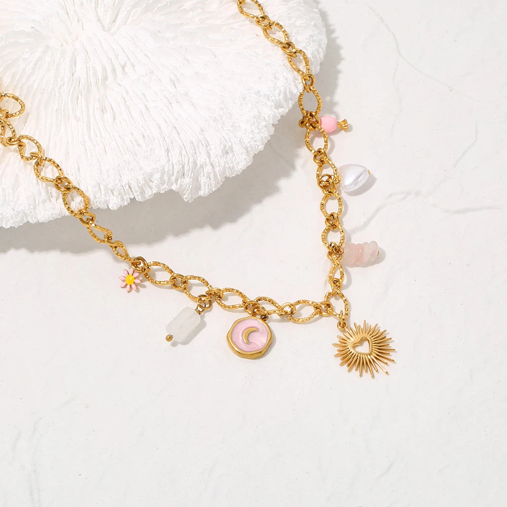 Collana Cuore di Sole – Pendente dorato con charms simbolici