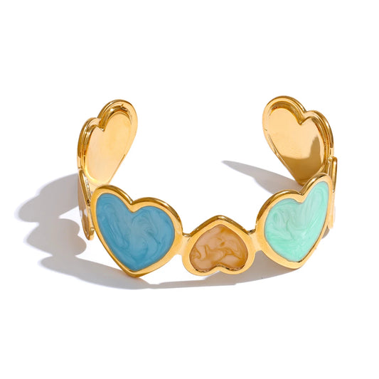 Bracciale Rigido Cuori Smaltati – Acciaio Inossidabile Dorato | 3 Varianti Colorate