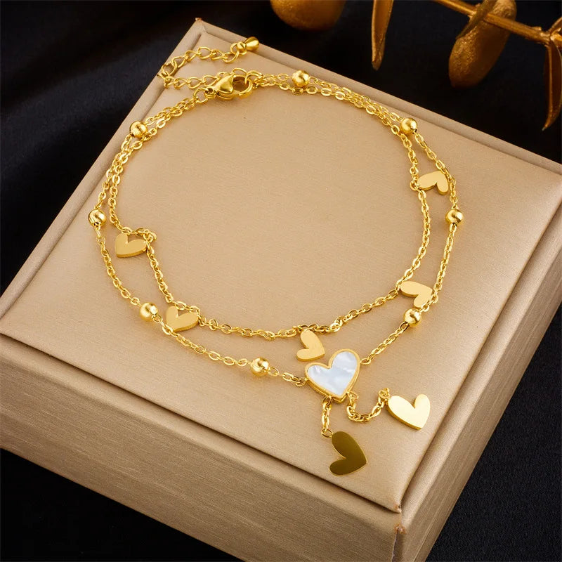 Collezione Cavigliere “Legami d’Amore” – Design a Cuore con Doppia Catena
