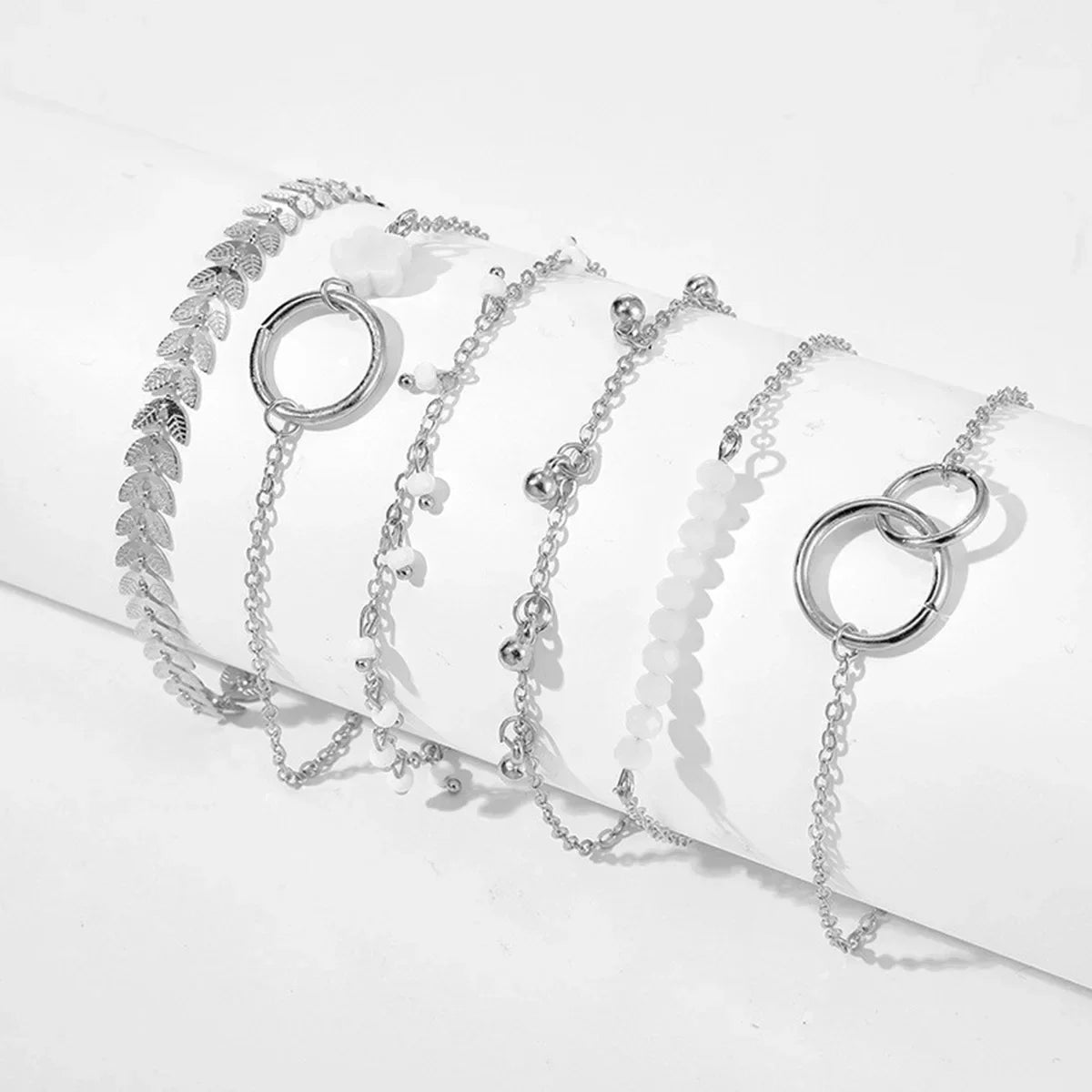 Collezione Dual Charm – Set Braccialetti Oro & Argento (5 o 6 pz)