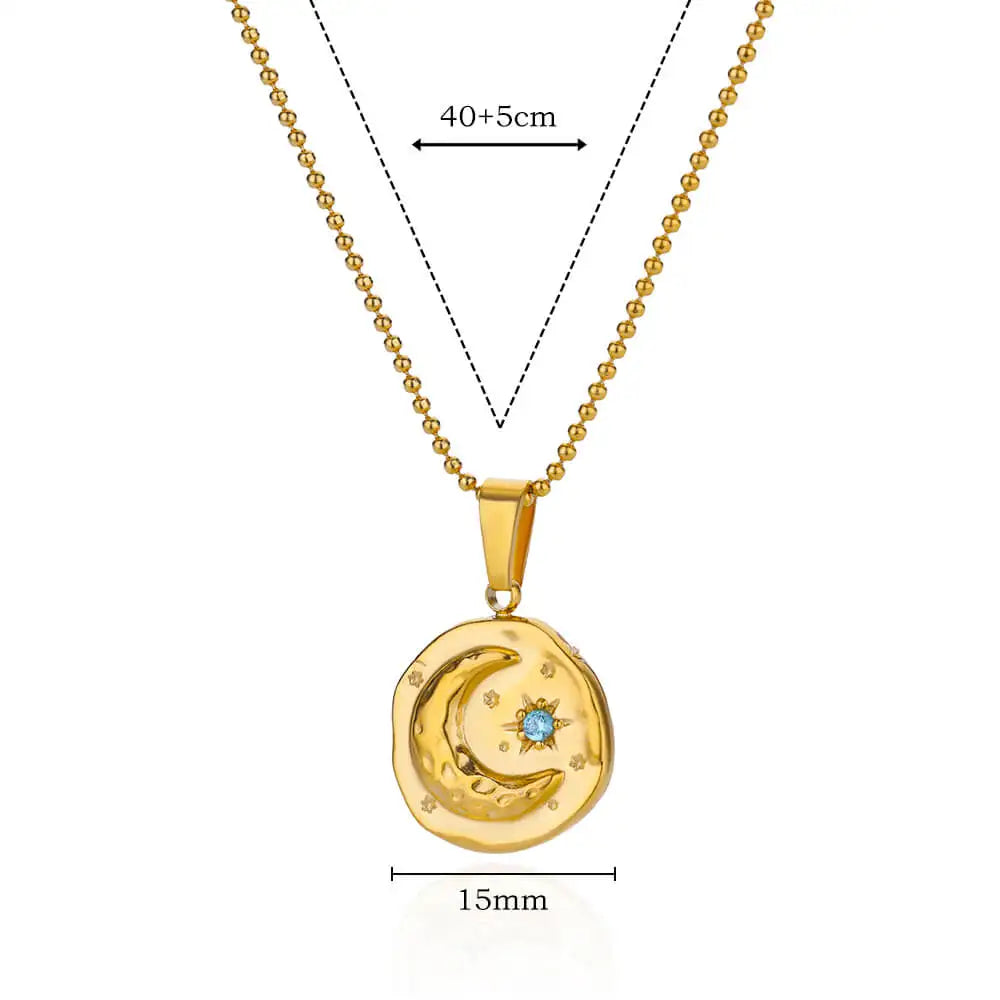 Collana con stella e luna in zircone blu – Magia dorata