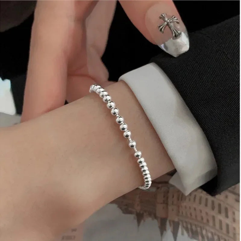 Bracciale con perline intrecciate