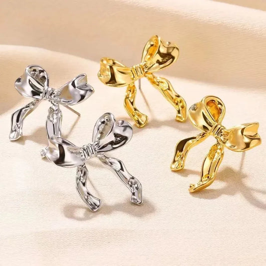 Orecchini  Fiocchi dorati eleganti in stile vintage