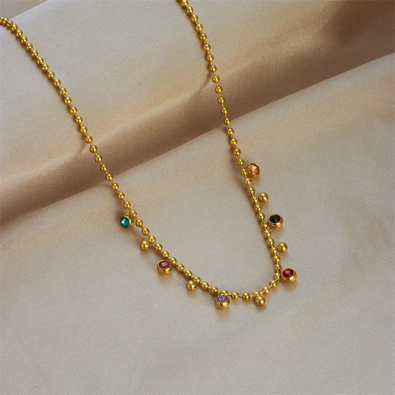 Arcobaleno di Cristallo – Collana a Sfera in Acciaio Lucente