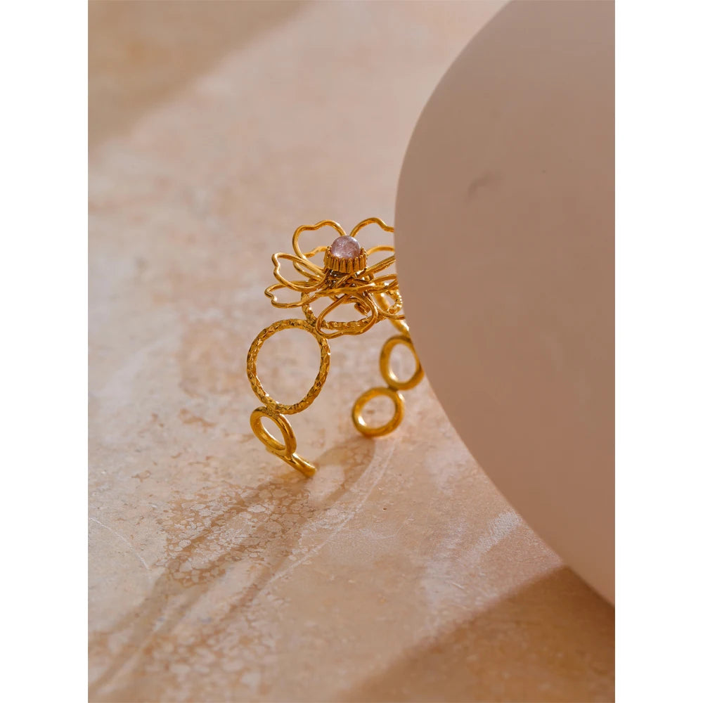 Anello “Petal Frame” – Fiore Intrecciato
