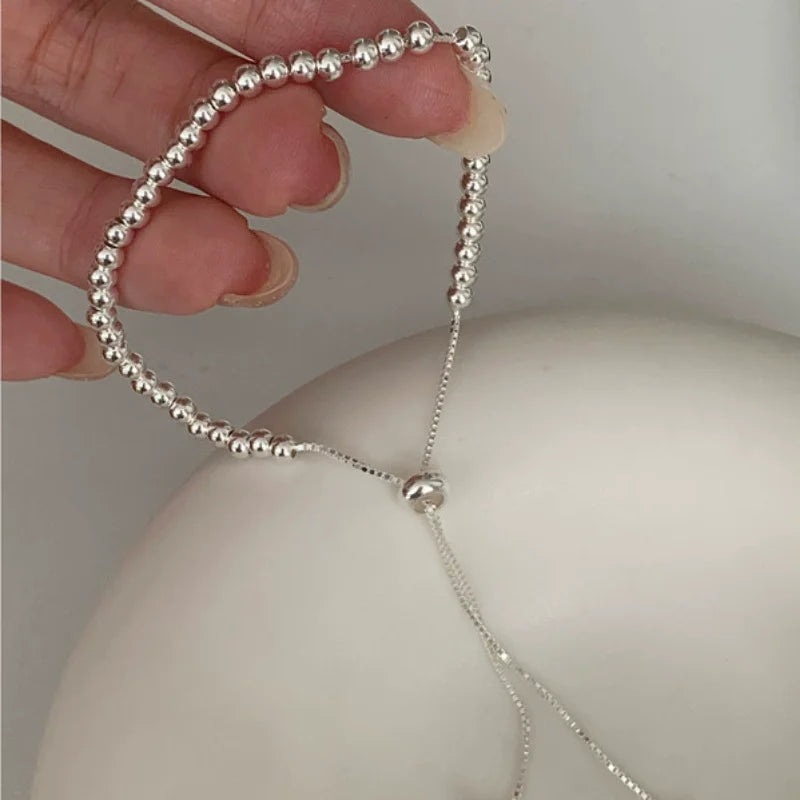 Bracciale con perline intrecciate