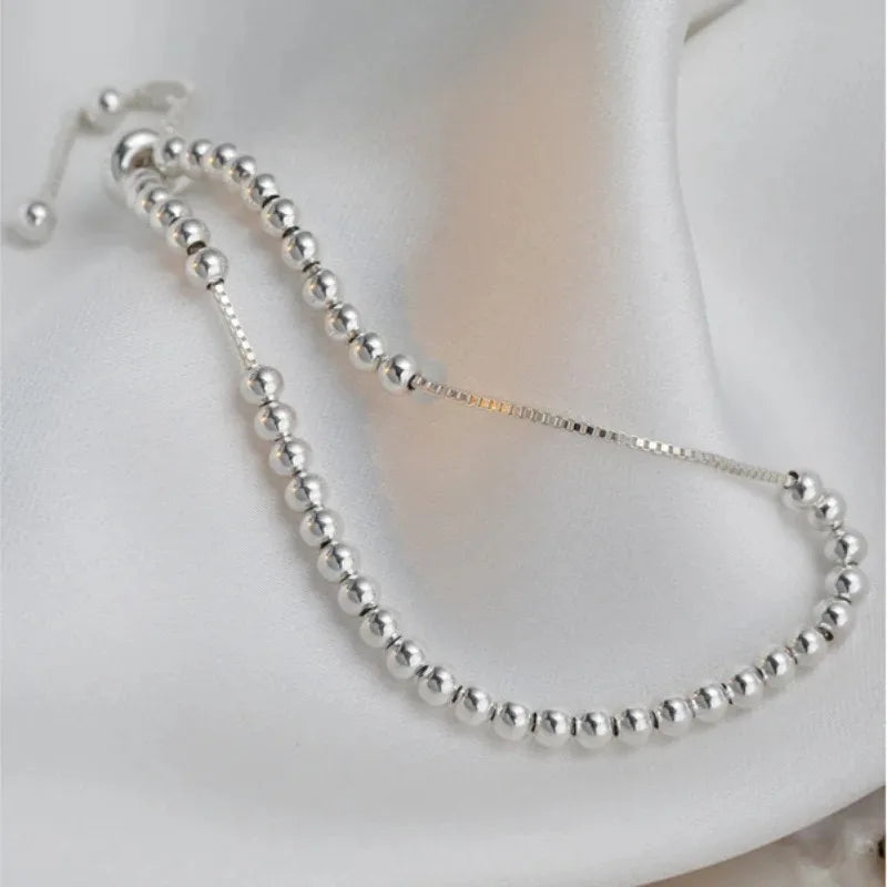 Bracciale con perline intrecciate