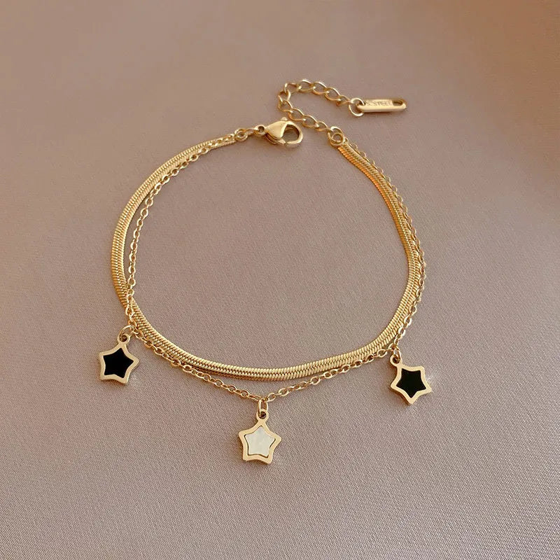 Set collana e bracciale a catena multistrato con stella – Desideri in acciaio