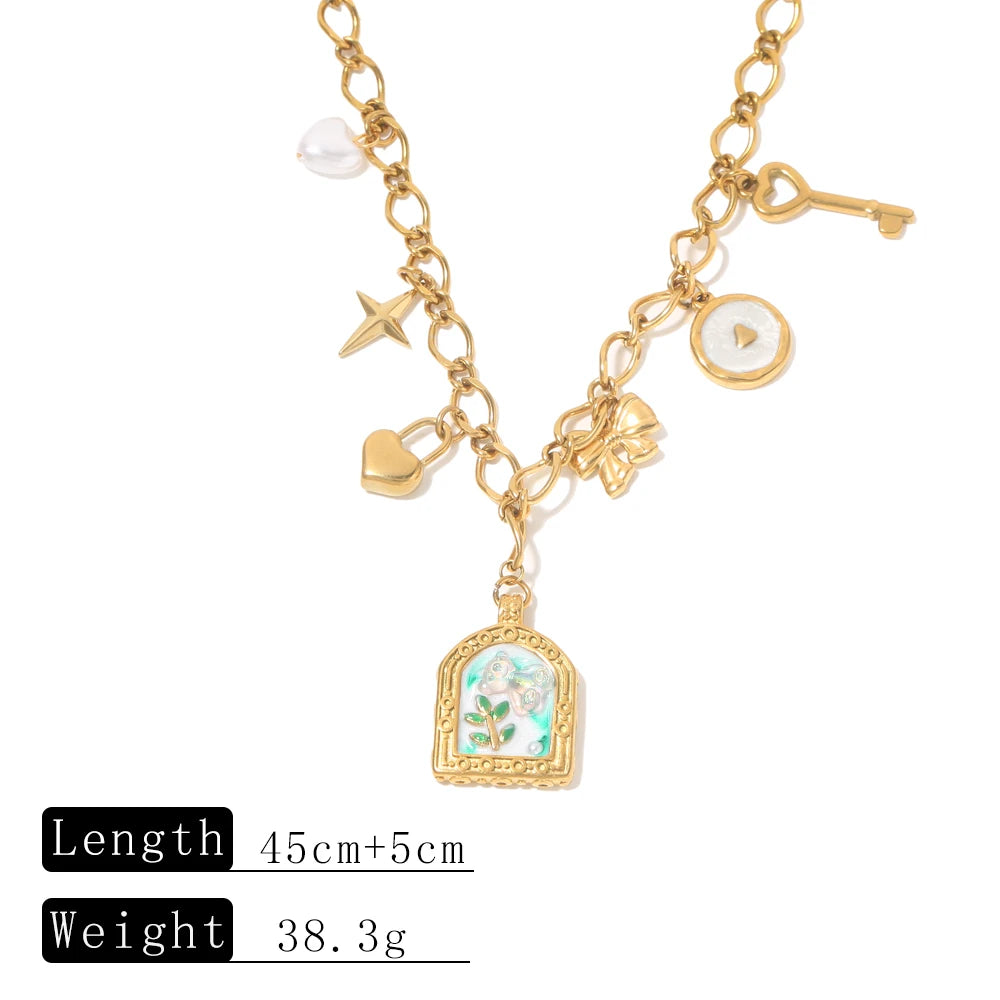Collana con ciondolo fiore smaltato – 2 varianti rosa o azzurro – Acciaio dorato