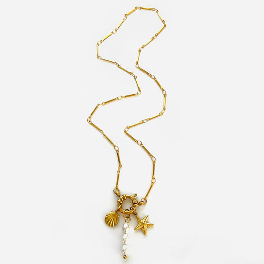 Collana Stella Marina e Conchiglia – Eleganza Estiva con Perla