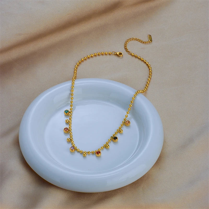 Arcobaleno di Cristallo – Collana a Sfera in Acciaio Lucente
