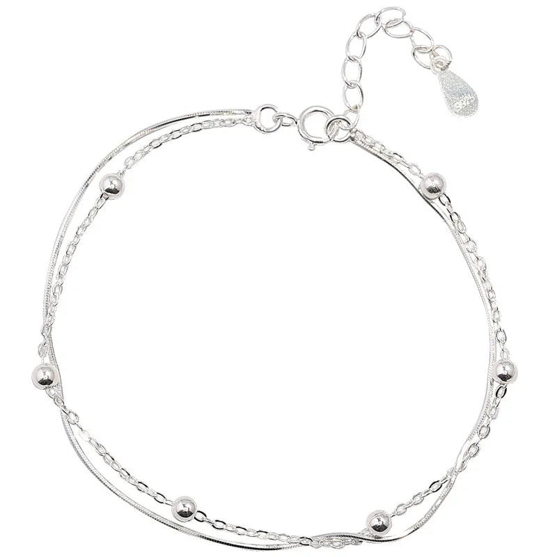 Desiderio in Argento – Bracciale Portafortuna a Doppio Strato"