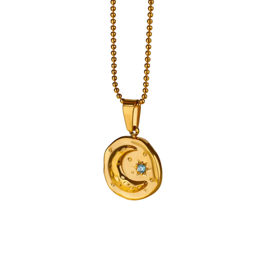 Collana con stella e luna in zircone blu – Magia dorata