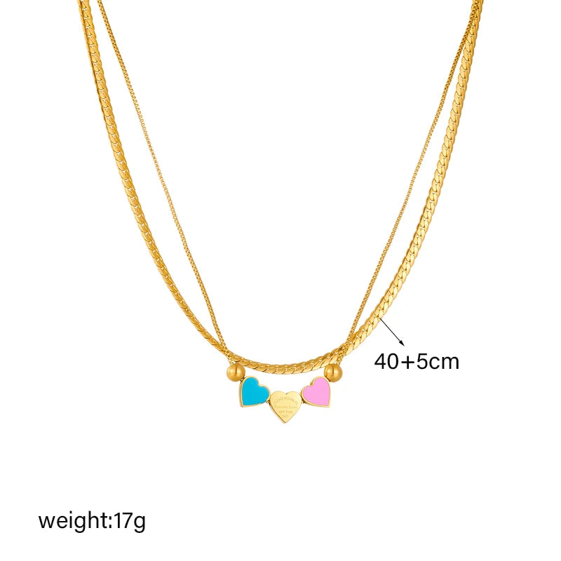 Collana a doppia catena con ciondolo 3 cuori pastello