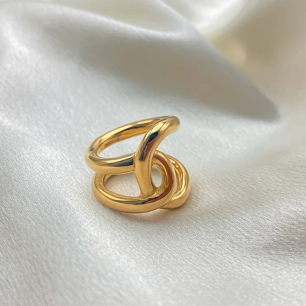 Anello “Twist Knot” – Linee Intrecciate