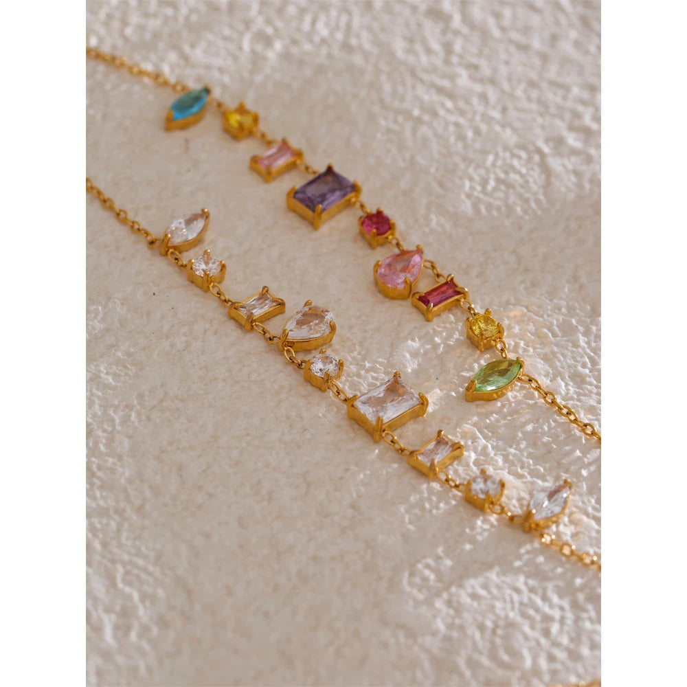Collana con zirconi colorati in acciaio dorato