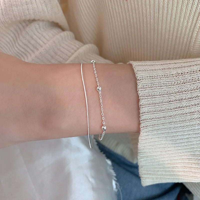 Desiderio in Argento – Bracciale Portafortuna a Doppio Strato"