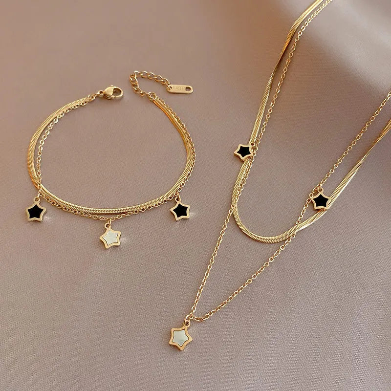 Set collana e bracciale a catena multistrato con stella – Desideri in acciaio