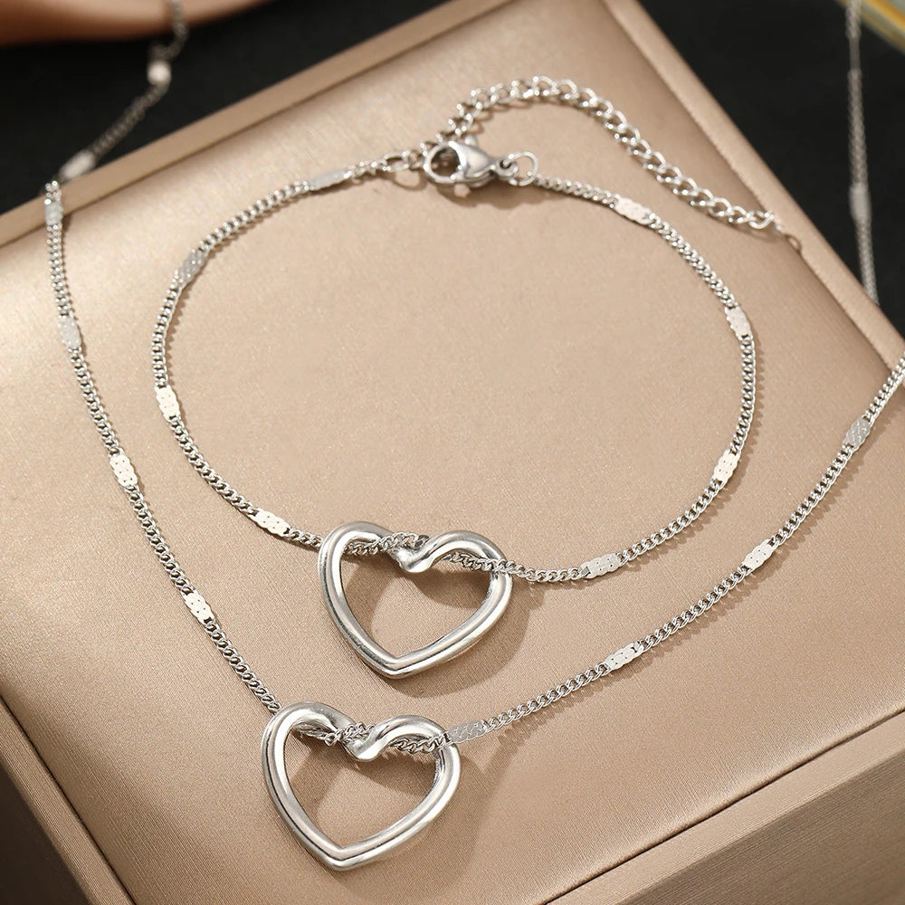 Set di gioielli in acciaio Cuore intrecciato